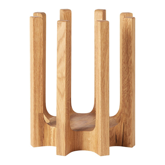 Natural wood plant holder with a minimalist design and smooth finish, featuring a light oak color and simple geometric pattern.