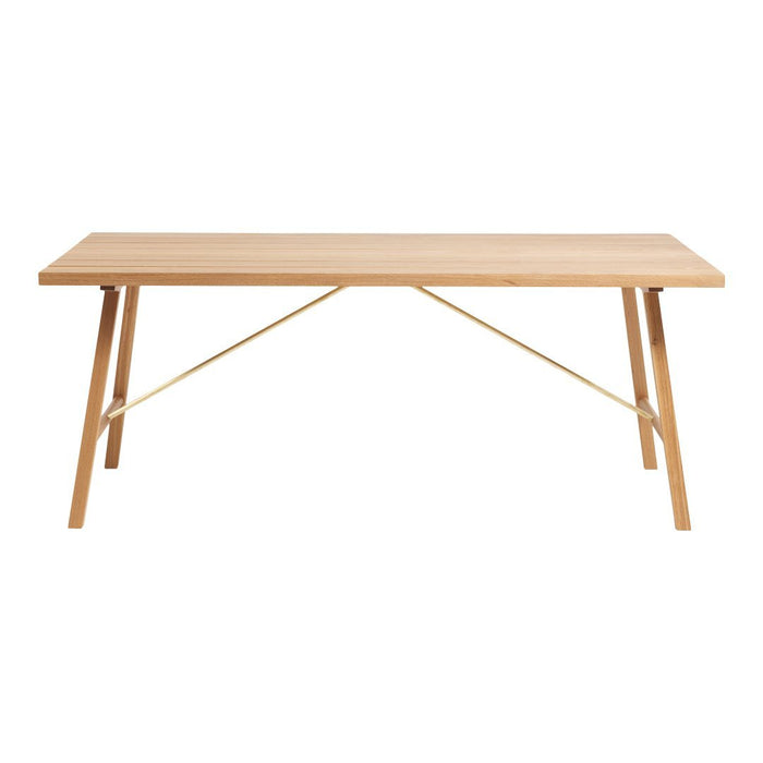 Natural wood dining table with a light finish and minimalist design. Clean lines and subtle golden accents.