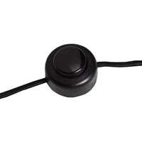 Black round switch with smooth surface and a black cord. Simple and modern design for easy operation.