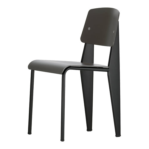 Modern black chair with a sleek design and a smooth finish, featuring angular legs and a minimalist aesthetic.
