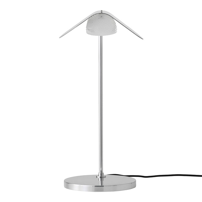 Silver modern table lamp with a sleek chrome finish and perforated shade design. Elegant and minimalist decor.