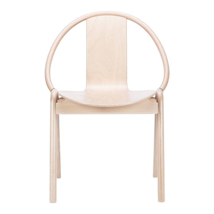 Light wood chair with smooth, minimalist design and circular backrest. Perfect for modern decor.