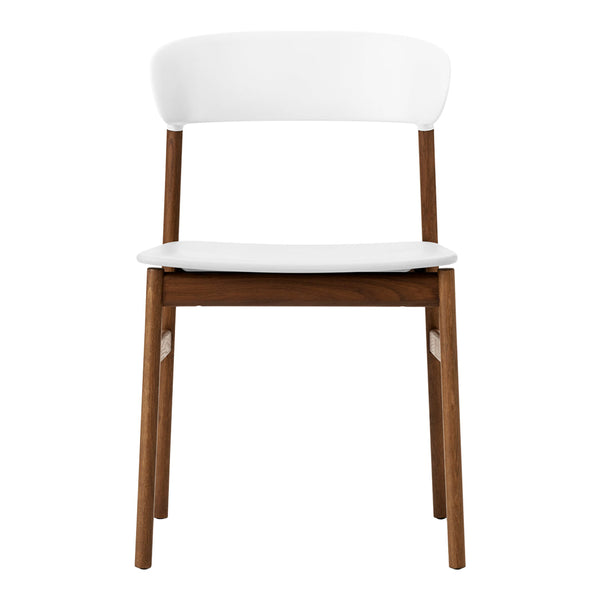 White modern chair with a sleek design and warm brown wooden legs. Simple and stylish for any decor.
