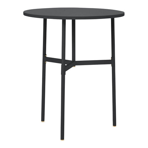 Black round table with a minimalist design and gold accents on the legs, perfect for modern decor.