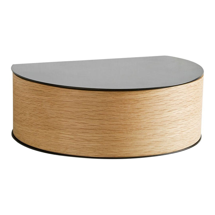 Half-moon table with a sleek black top and a light wood grain body, featuring smooth, modern lines and minimalistic design.