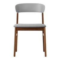 Gray and light gray chair with a wood frame, showcasing a minimalist design and soft upholstery pattern.