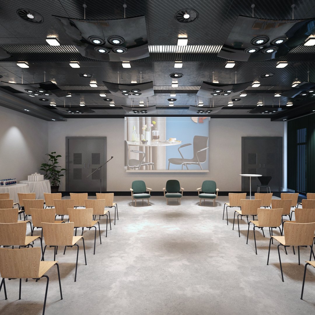 Modern conference room with black ceiling, gray flooring, and wooden chairs in a neutral color palette.