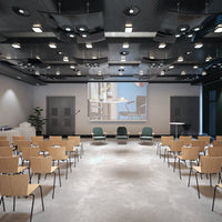 Modern conference room with black ceiling, gray flooring, and wooden chairs in a neutral color palette.