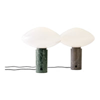 Green and gray marble base lamps with white glass shades, featuring sleek, modern designs. Perfect for stylish decor.