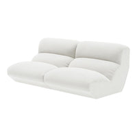 White modern sofa with plush, textured fabric and smooth, minimalist design. Ideal for contemporary living spaces.