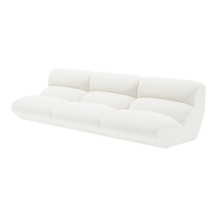 White cushioned sofa with a smooth, textured surface and modern, minimalist design. Perfect for contemporary spaces.