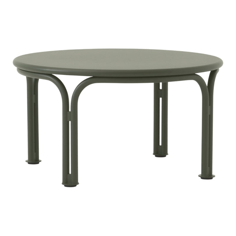 Round green metal coffee table with smooth surface and curved legs, ideal for modern decor.