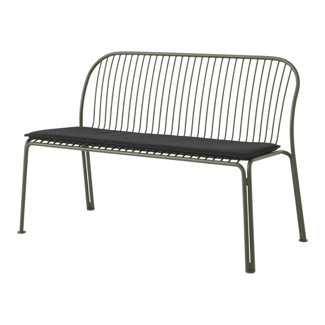 Green metal bench with thin stripes and a sleek black cushion for a modern look. Perfect for outdoor or indoor seating.