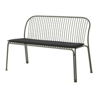 Green metal bench with thin stripes and a sleek black cushion for a modern look. Perfect for outdoor or indoor seating.