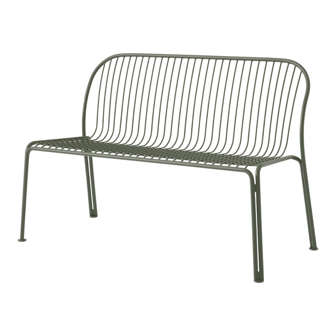 Green metal bench with a minimalist design featuring sleek, horizontal lines and a simple modern aesthetic.