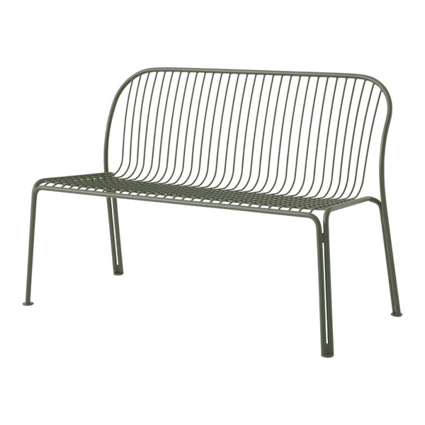 Green metal bench with a minimalist design featuring sleek, horizontal lines and a simple modern aesthetic.