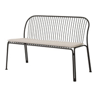 Black metal bench with sleek, vertical lines and a light beige cushion for a modern, minimalist look.