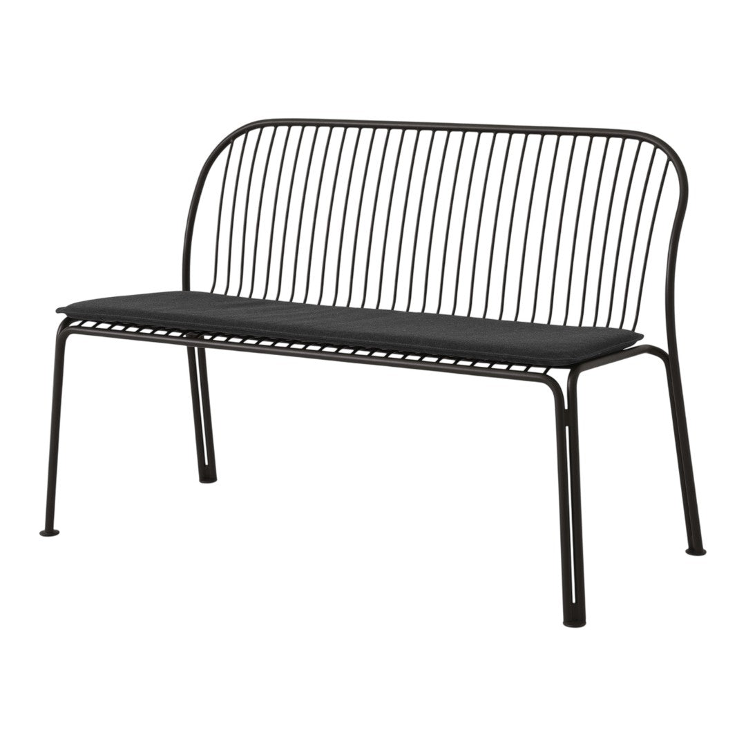 Black metal bench with sleek, minimalist lines and a vertical striped backrest for a modern touch.