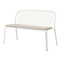 White metal bench with a minimalist design and neutral beige cushion for a modern touch.