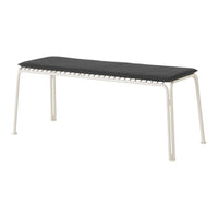 Black cushioned bench with a sleek white metal frame and a minimalist design. Perfect for modern interiors.