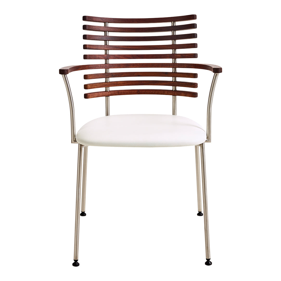 Modern chair with brown wood slat backrest, white seat cushion, and silver metal legs. Elegant and minimalist design.
