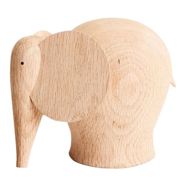 Natural wood elephant figure with a smooth, light oak finish and subtle grain pattern. Perfect for decor.