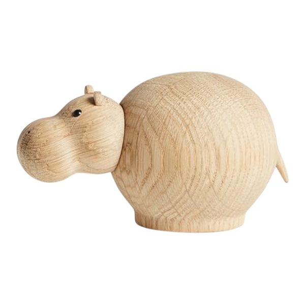 Natural wood hippo figurine with a smooth, light grain pattern, featuring a rounded body and minimalist design.