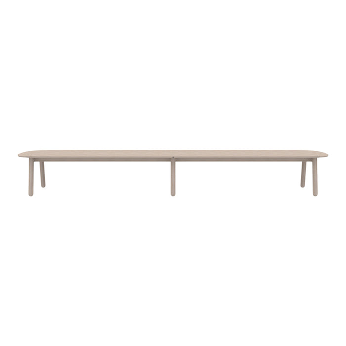 Light beige bench with a smooth, elongated design and minimalist style, perfect for modern decor.