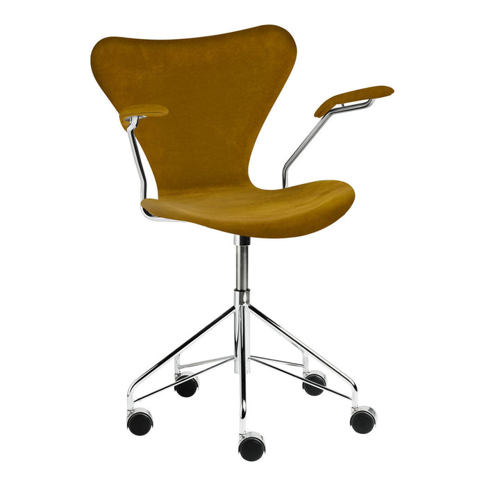 Stylish mustard yellow chair with smooth curves and chrome accents, featuring a modern, sleek design.
