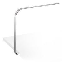 Stylish silver metal lamp with a sleek, modern design against a minimalist white background.