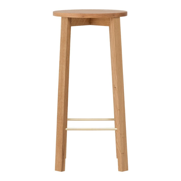 Natural wood bar stool in light oak finish with a smooth, round seat and simple, minimalistic design.