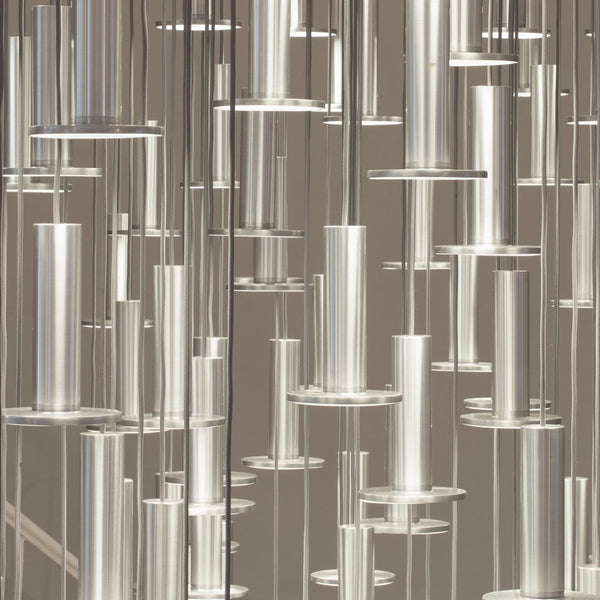 Clear acrylic tubes in a sleek, modern arrangement with a silver and transparent finish. Perfect for contemporary decor.