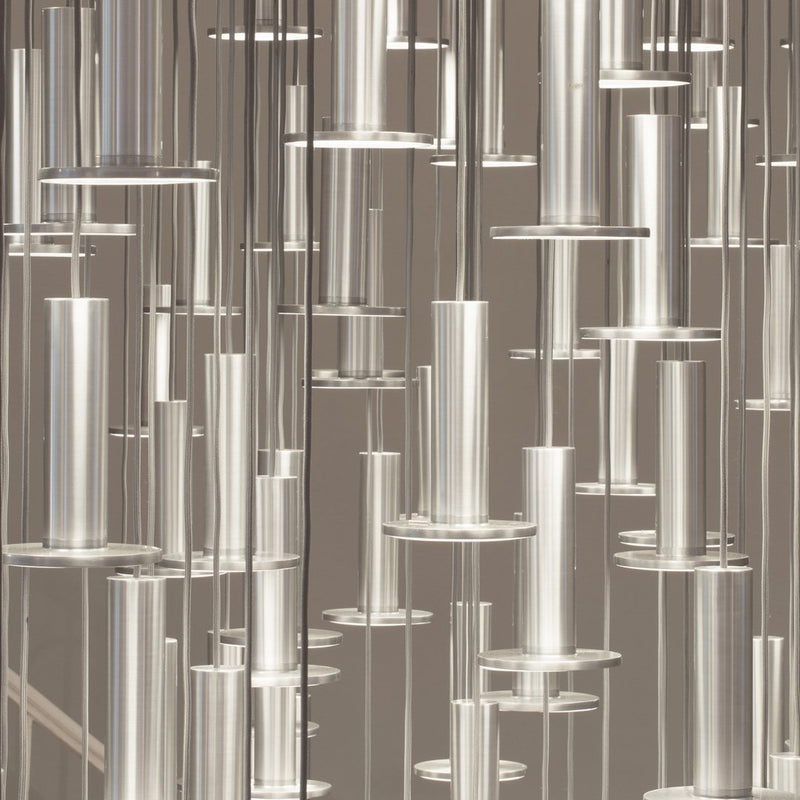 Clear acrylic tubes in a sleek, modern arrangement with a silver and transparent finish. Perfect for contemporary decor.