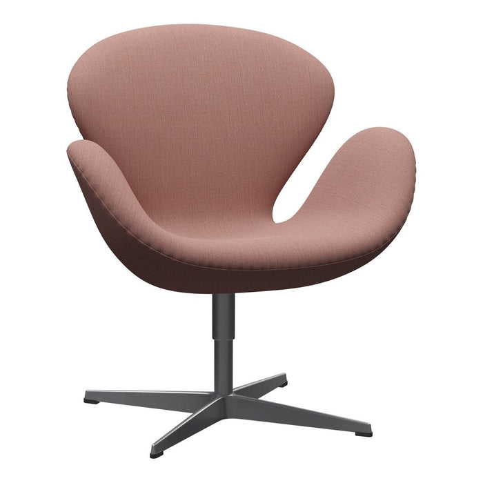 Pink upholstered chair with smooth curves and a sleek metal base, perfect for modern decor.