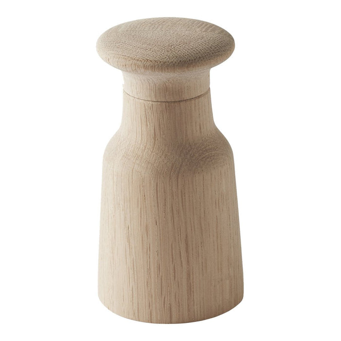 Natural light wood grain pepper mill with a smooth, minimalist design. Ideal for modern kitchen decor.