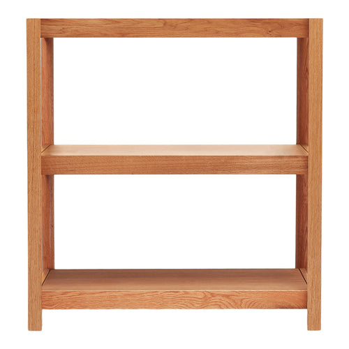 Wooden shelving unit in warm oak finish with a simple, minimalist design and smooth, natural grain pattern.