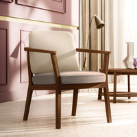 "Modern cream and beige armchair with a wooden frame, set against a soft purple background."