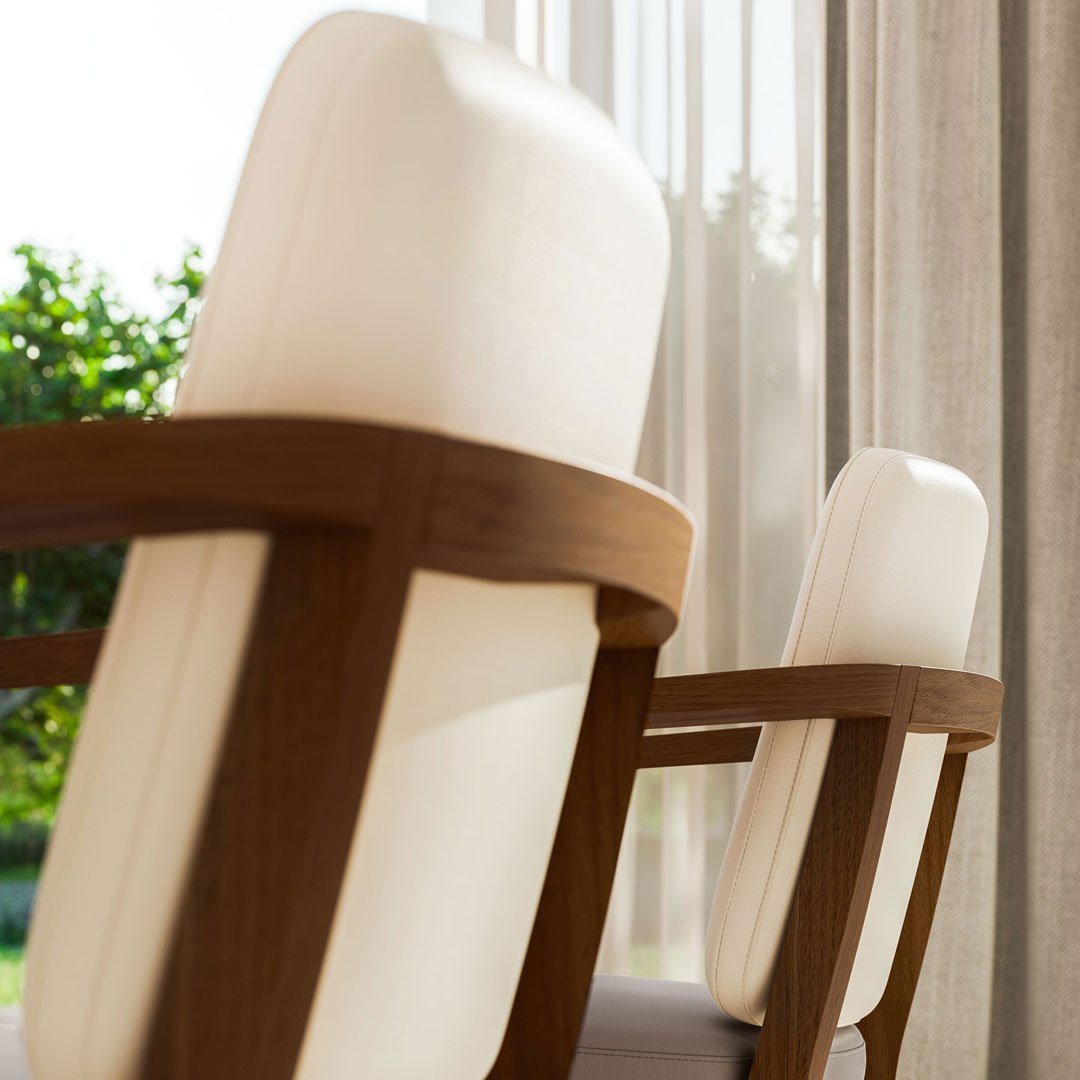 "Elegant white upholstered chairs with natural wooden arms, featuring a soft, minimalist design and natural light backdrop."