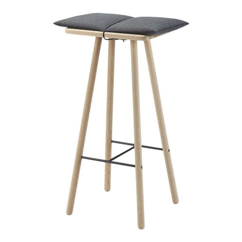 Gray cushioned bar stool with light wood legs and a black metal support, featuring a simple, modern design.