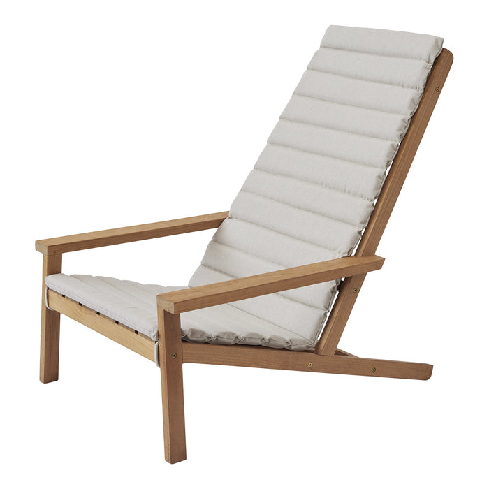 Light beige cushioned lounge chair with a sleek wooden frame and vertical ribbed fabric pattern.