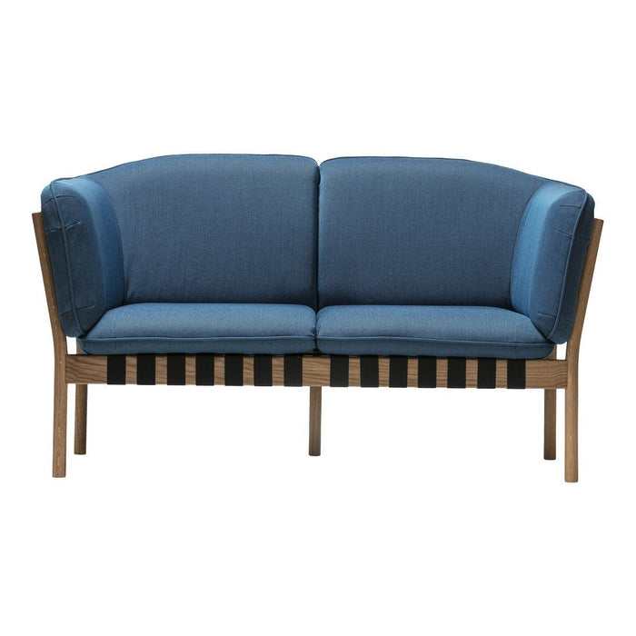 Blue upholstered loveseat with a striped wood base, featuring a modern design and soft fabric texture.