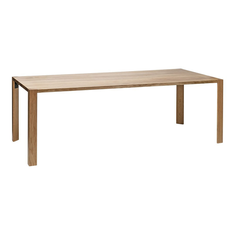 Light oak dining table with a smooth, minimalist design and natural wood grain pattern. Ideal for modern interiors.