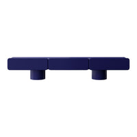 Navy blue geometric storage shelf with a smooth finish and cylindrical legs. Ideal for modern home decor.
