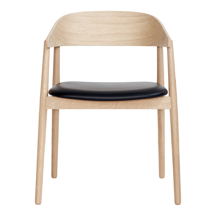 Light oak wood chair with a sleek black leather seat, featuring a minimalist design and natural finish.