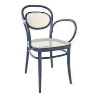 Navy blue chair with a woven cane seat and backrest, featuring elegant curves and a modern design.