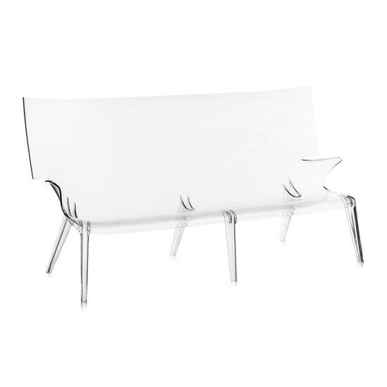 Clear acrylic sofa with a sleek, modern design and transparent finish, perfect for minimalist decor.