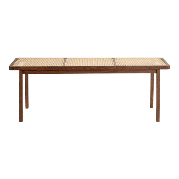 Natural wood table with a woven cane pattern top and smooth finish, featuring warm brown hues and a sleek rectangular design.