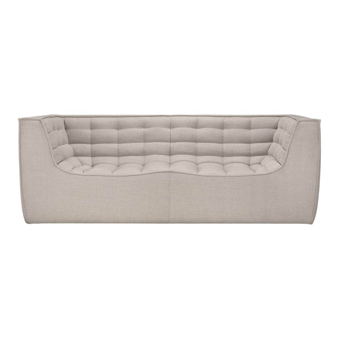 Modern beige sofa with a textured, tufted design and sleek, simple lines. Perfect for contemporary living spaces.