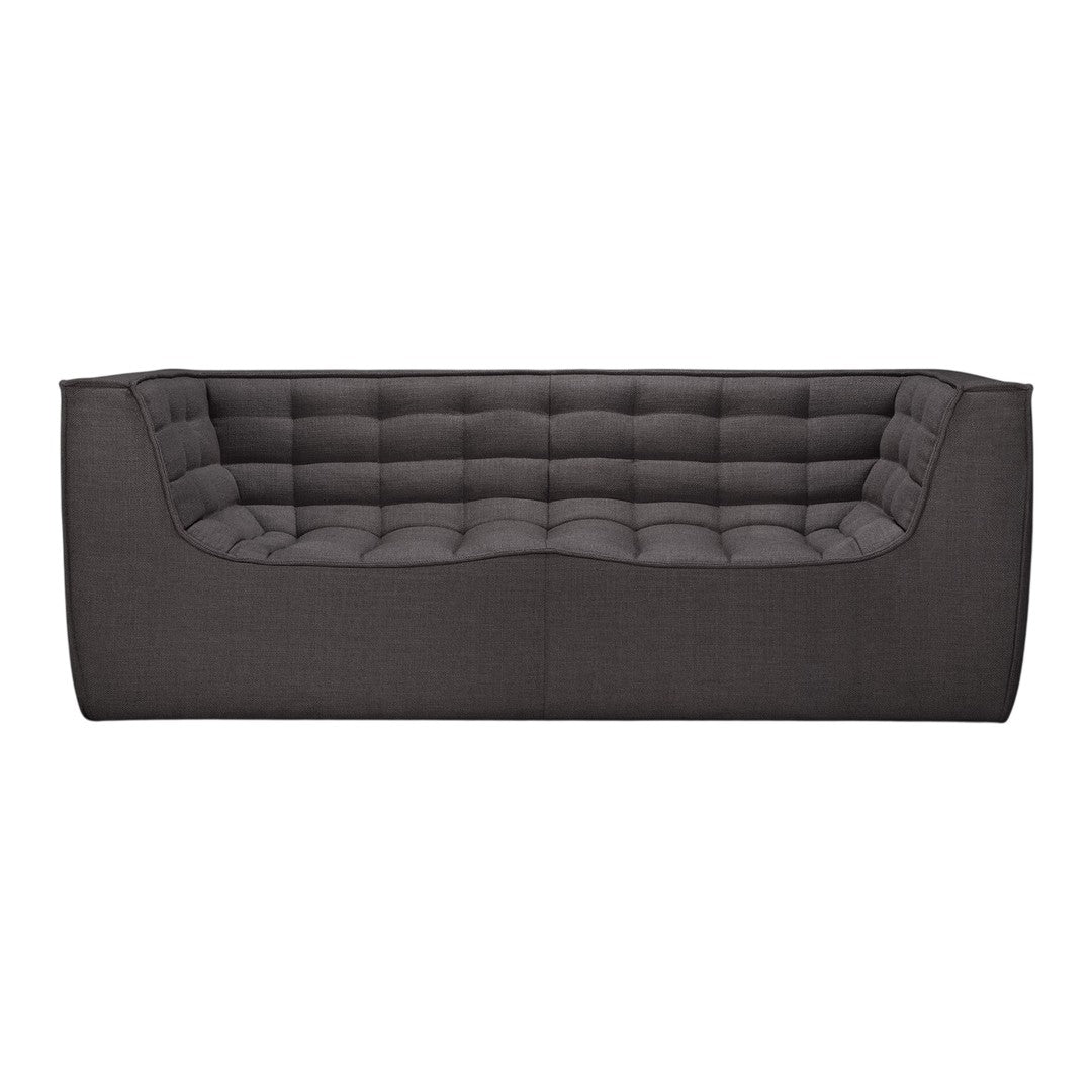 Dark gray tufted sofa with rectangular shape, featuring a smooth textured fabric and minimalist design.