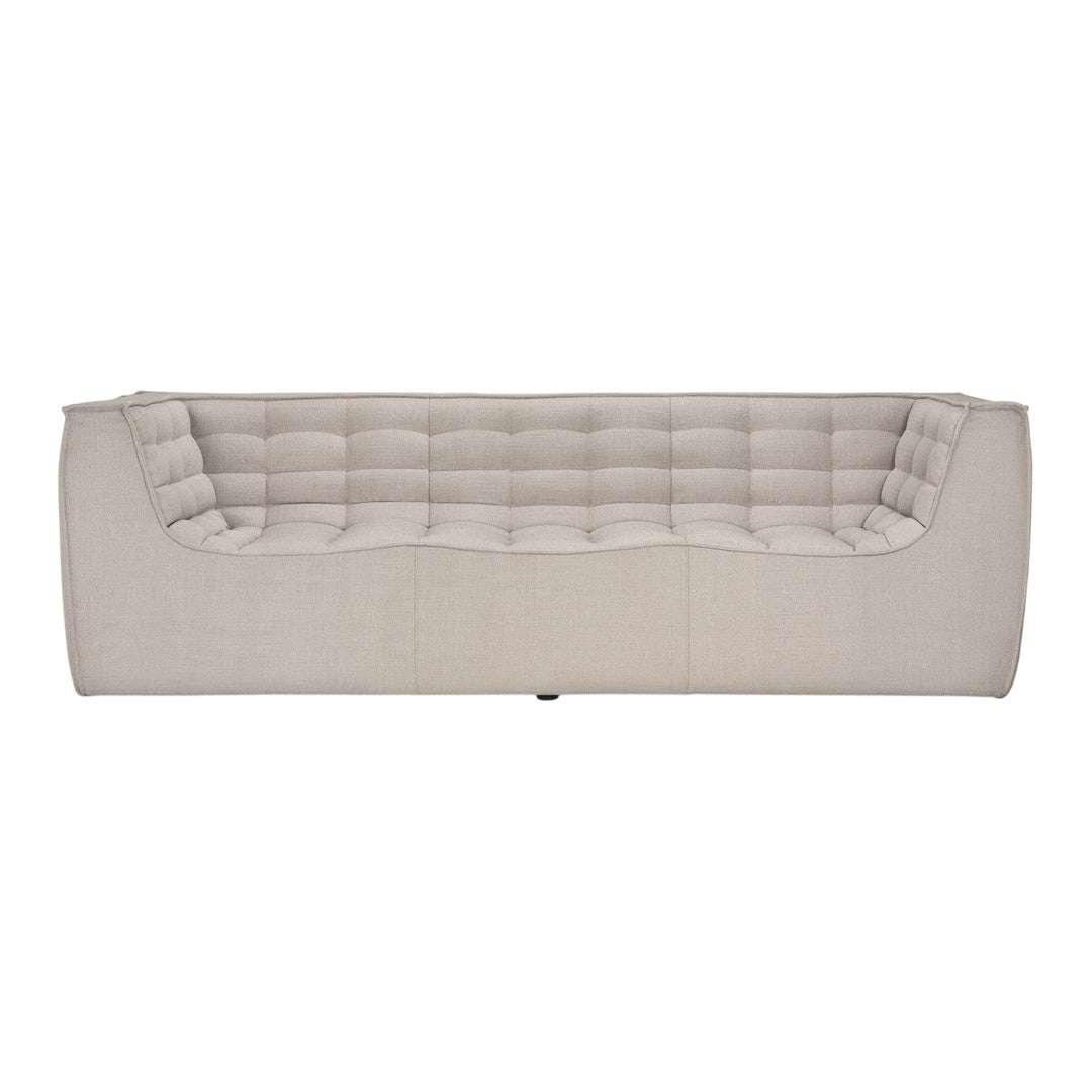 Beige tufted sofa with a sleek, minimalist design and subtle texture, perfect for modern interiors.